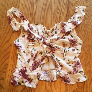 Cropped ruffle floral tank top.